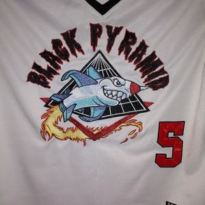 Black pyramid baseball jersey..